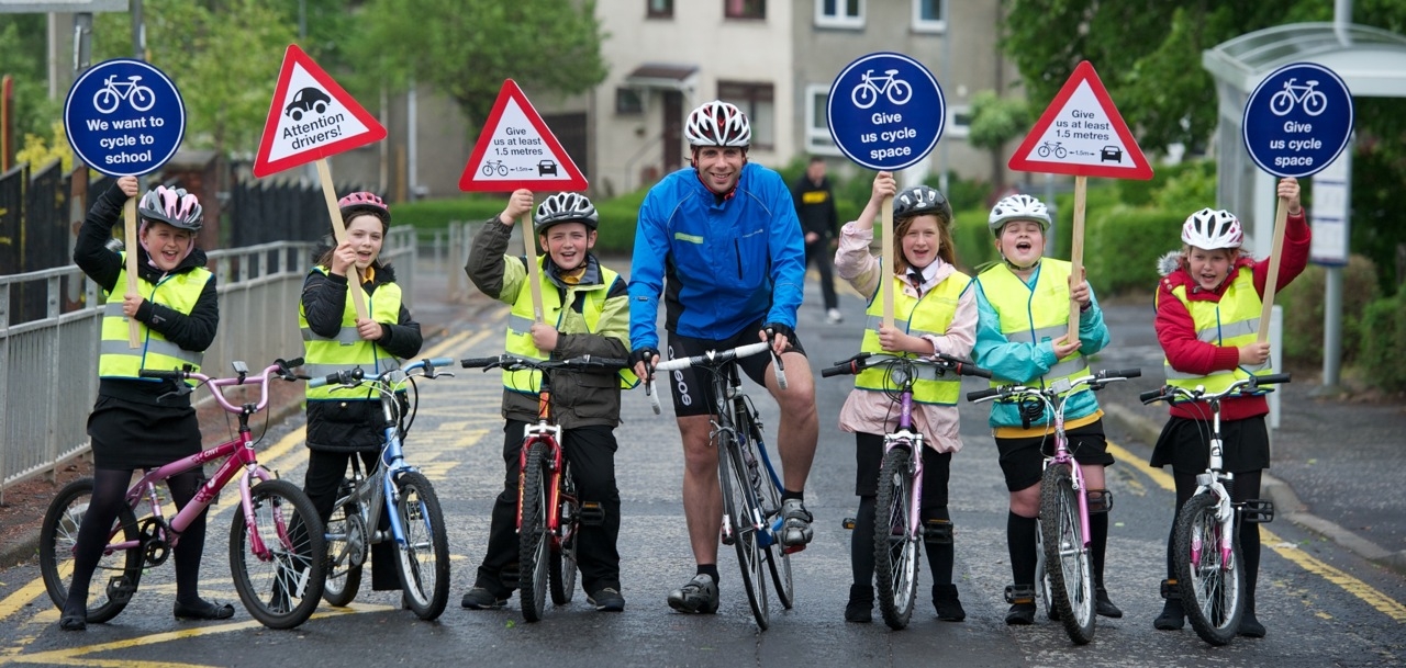 Round the world rider campaigns to help kids cycle to school