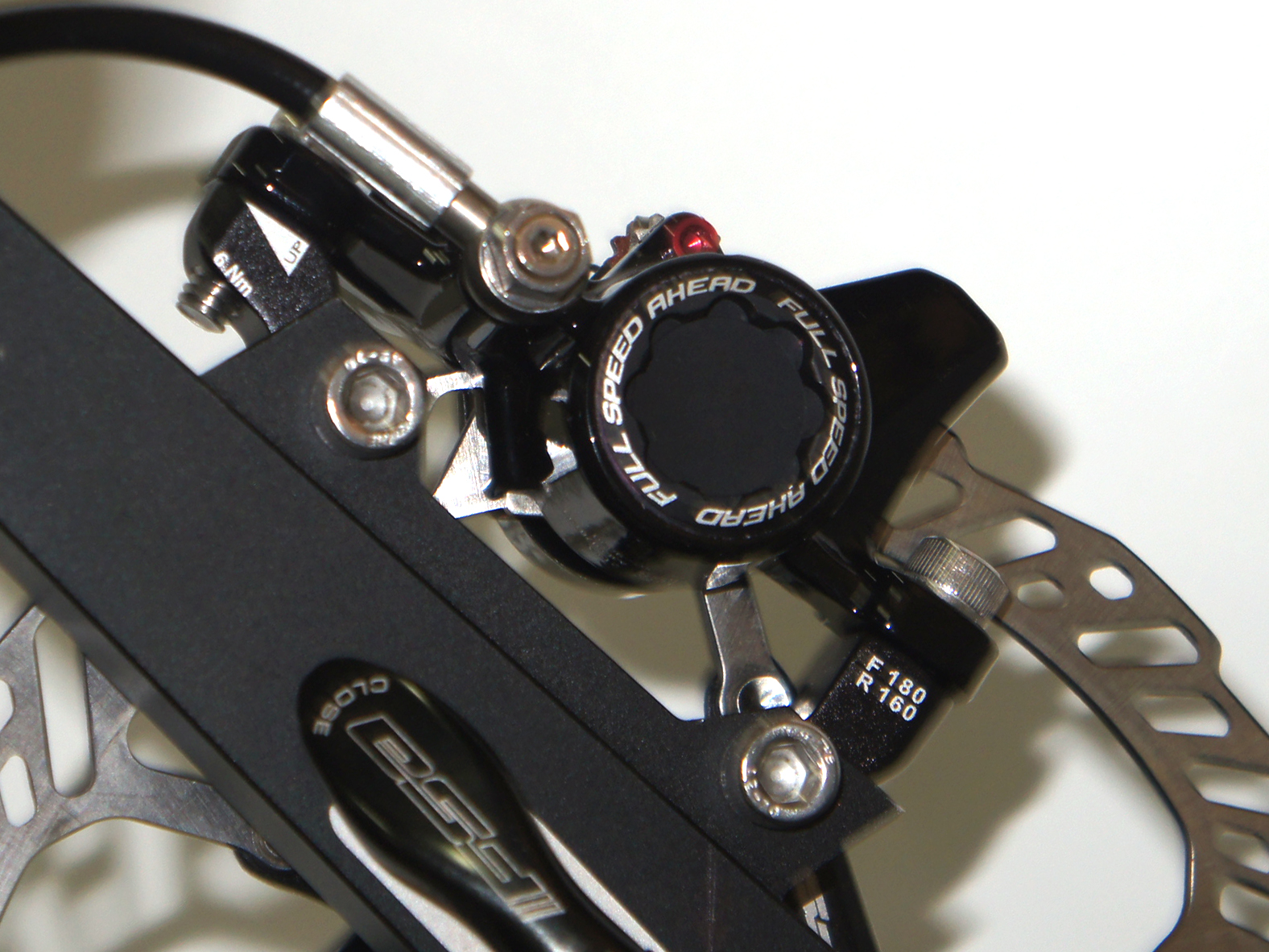 Titanium hardware, nicer rotor.