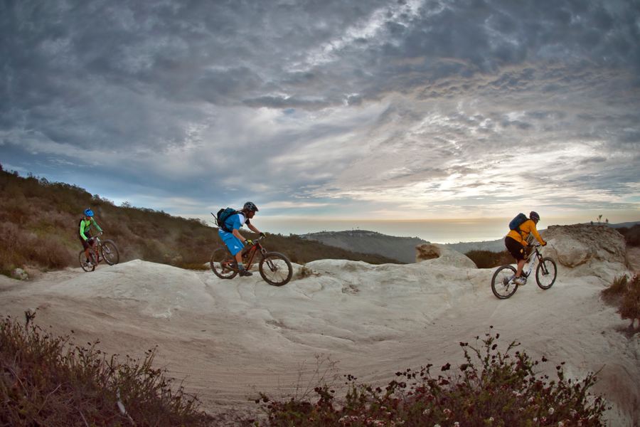 Richie, Holger, and Hans above Crank Brothers HQ