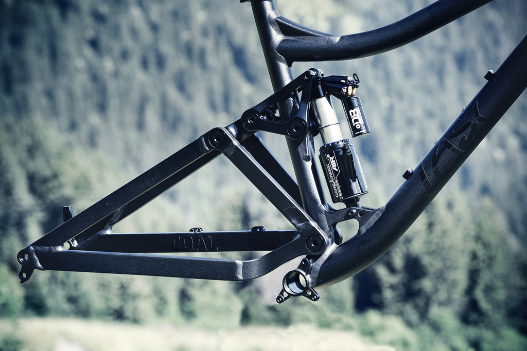 Single pivot, linkage, and rocker.