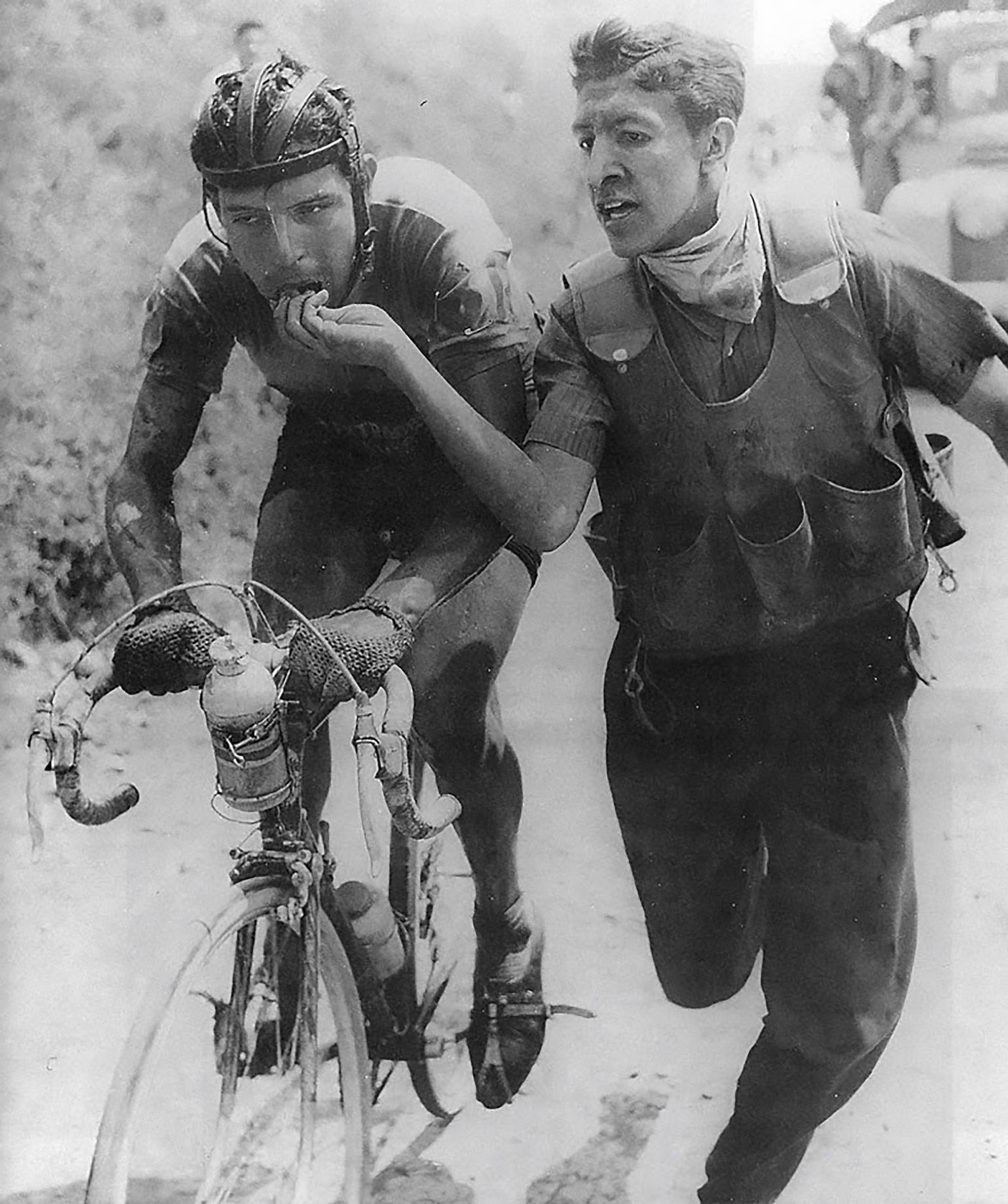 Colombian rider Ricardo Ovalle being fed bocadillo during the Vuelta a Colombia in the early 60’s. Photo by Horacio Gil Ochoa