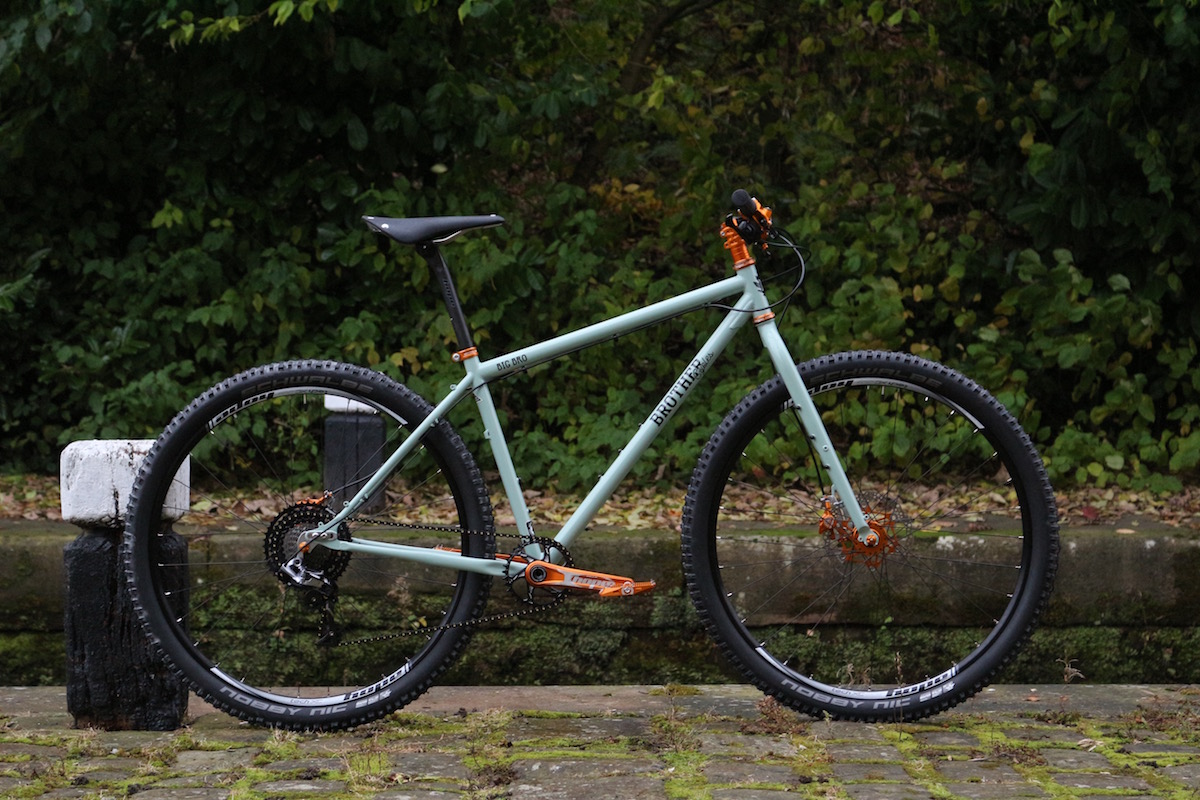 brother cycles big bro off road bikepacking touring hope brake crank pedal cassette orange bling shiny steel brooks