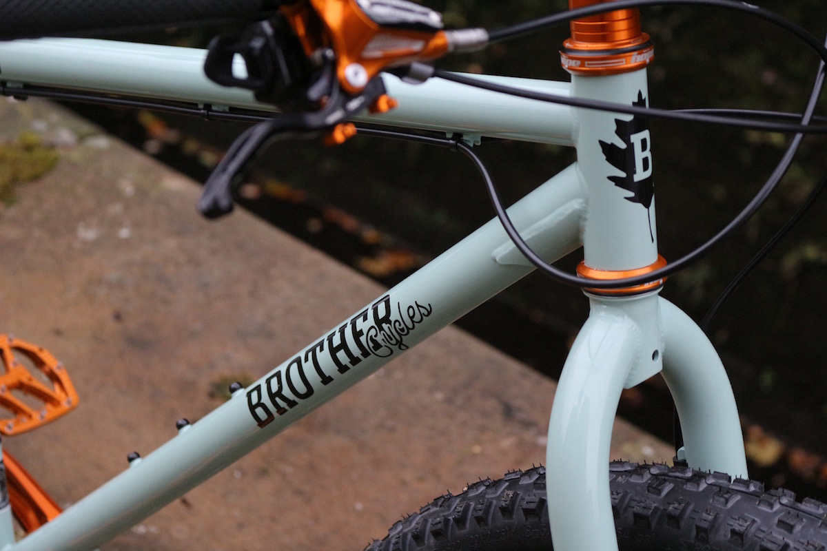 brother cycles big bro off road bikepacking touring hope brake crank pedal cassette orange bling shiny steel brooks