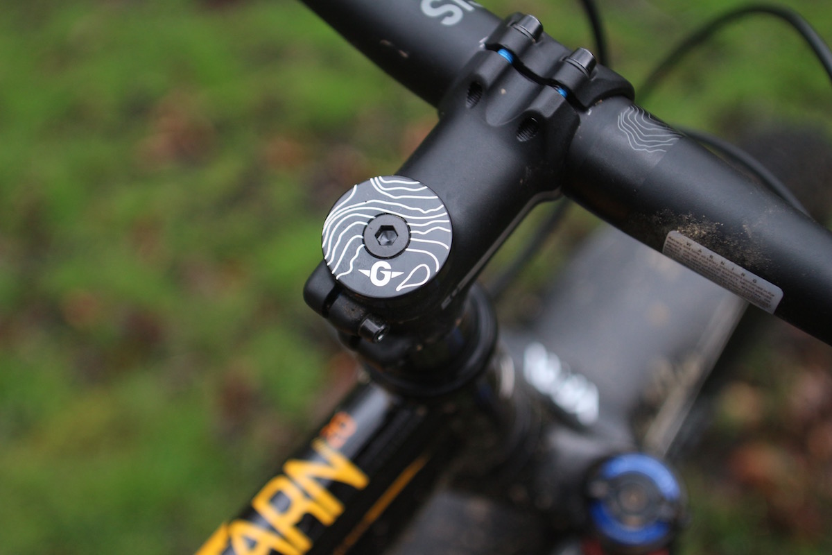 The detail carries through with contour lines graphics on frame, bar and top cap.
