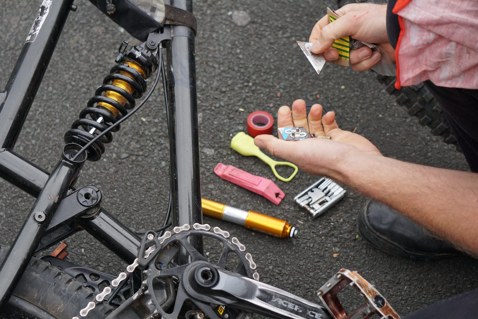 Rich uses his to carry a few trail essentials such as a single Pink Pedros tyre lever, inner tube, Fabric multi-tool, brass valve adapter for using petrol station pumps, red electrical tape, a BikeSure free Buff, a chain link and a Stanley Blade because “cutting tiptoes with teeth is well hard”.
