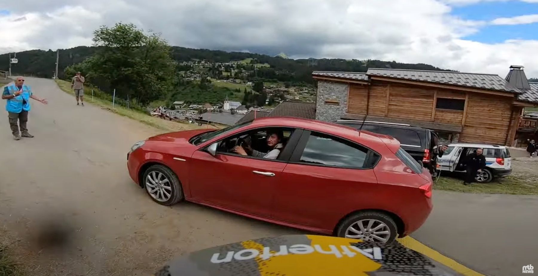Watch Andreas Kolb avoid a car accident on the Les Gets World Cup Course