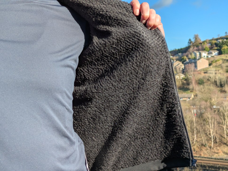 Close-up view of the inner lining of a jacket, showcasing its fluffy texture.