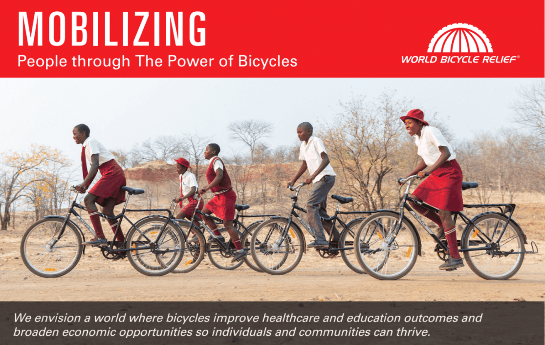 A group of young individuals riding bicycles on a dirt path, with trees in the background. The image promotes the World Bicycle Relief campaign, highlighting the power of bicycles to improve education and healthcare.