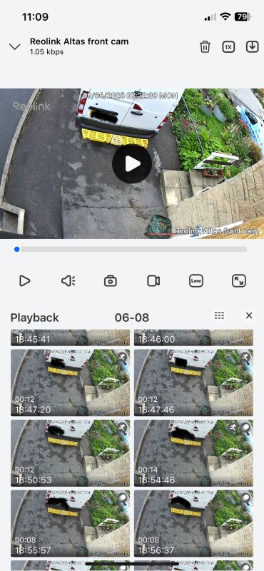 Screenshot of the Reolink Altas security camera app showing live footage of a van and surrounding area, with playback options for recorded events.