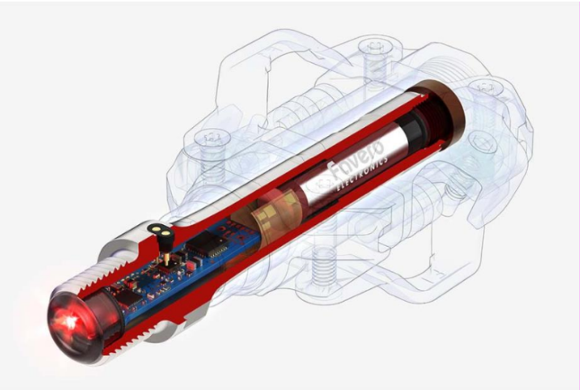 Cross-sectional diagram of Favero power meter pedal, showcasing internal components including sensors and battery.