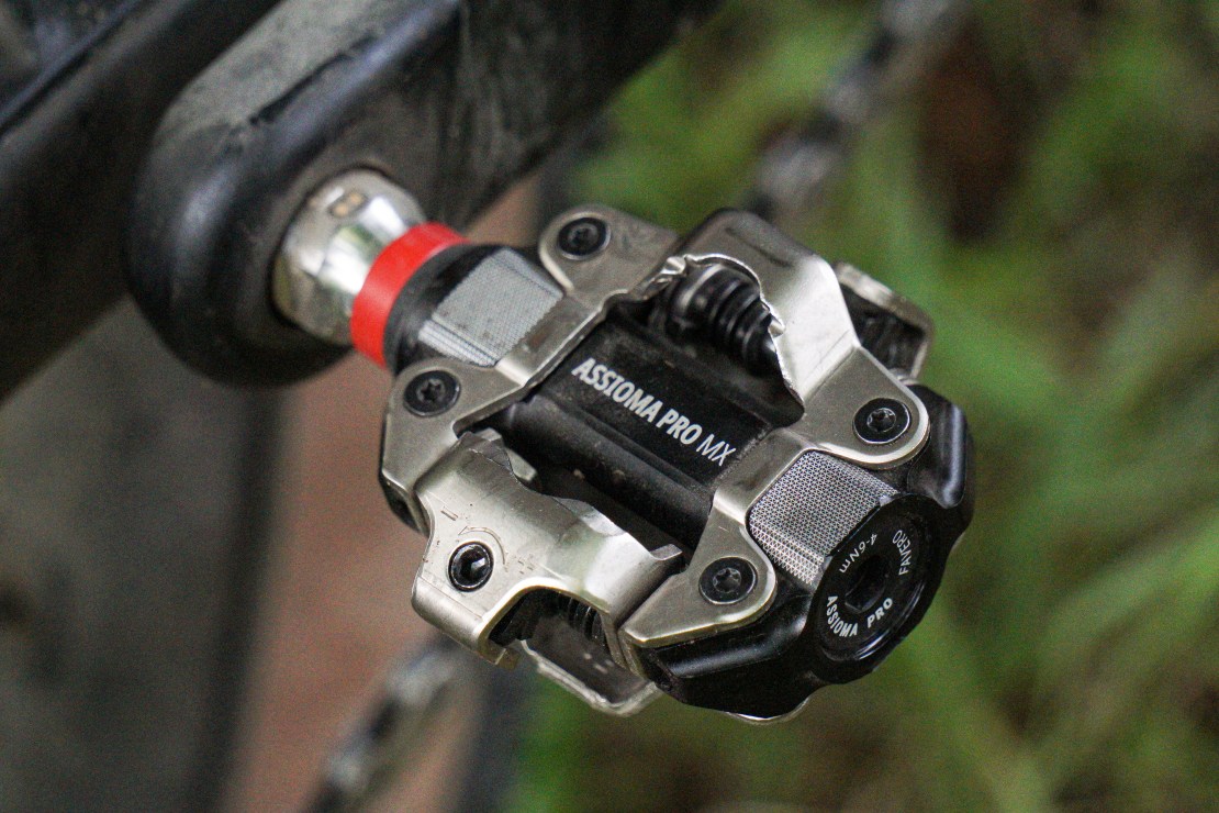 Close-up of a Favero Assioma Pro MX power meter pedal mounted on a mountain bike.